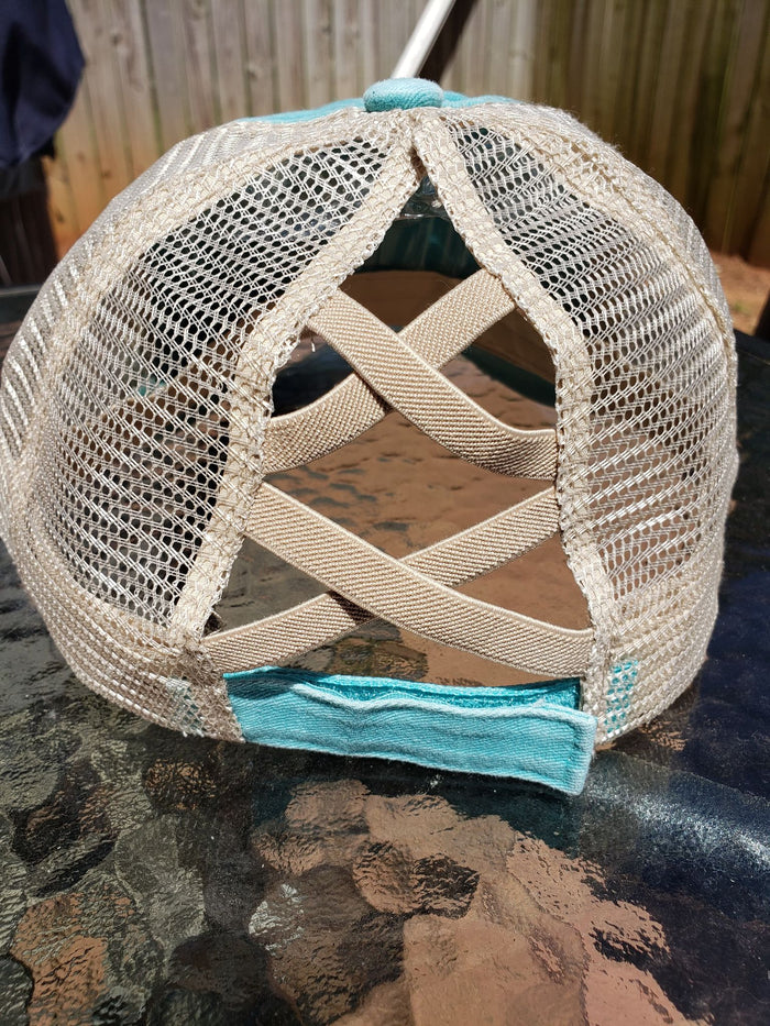 Blue criss cross ponytail hat