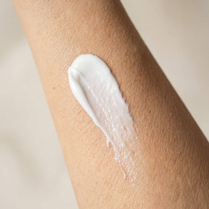 Magnesium cream swatch applied on skin showing texture and absorption