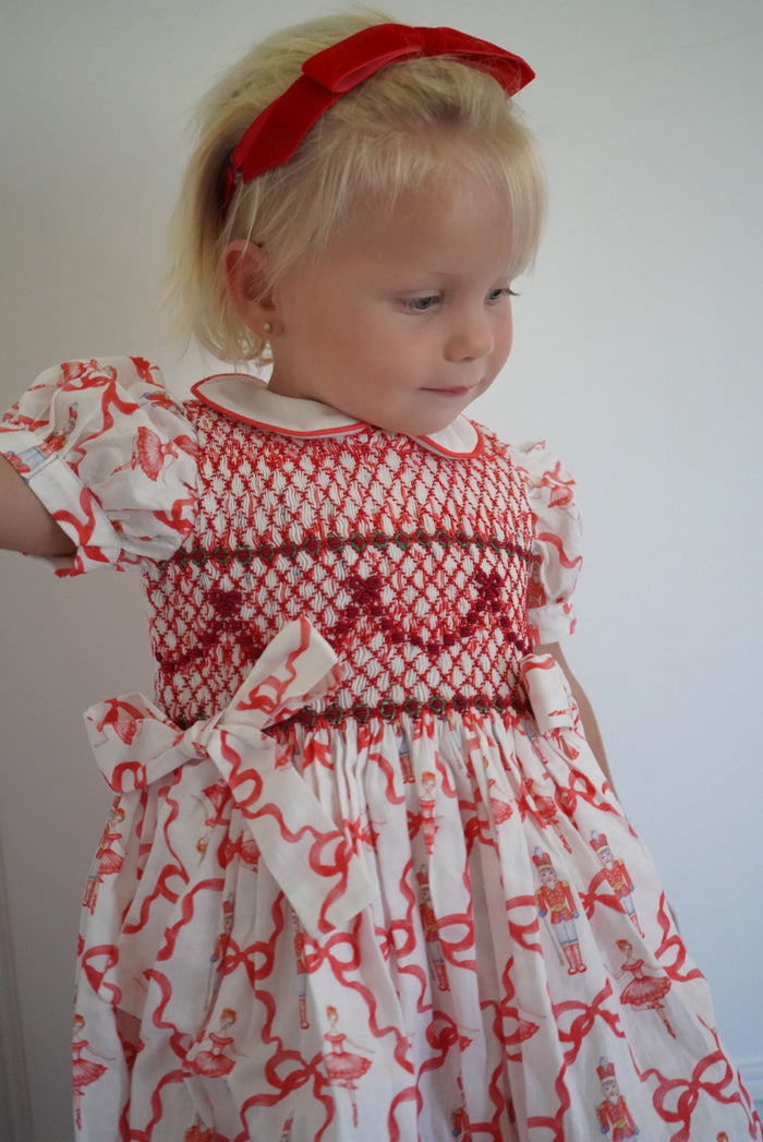 Nutcracker Red Bow Coquette Handsmocked Dress