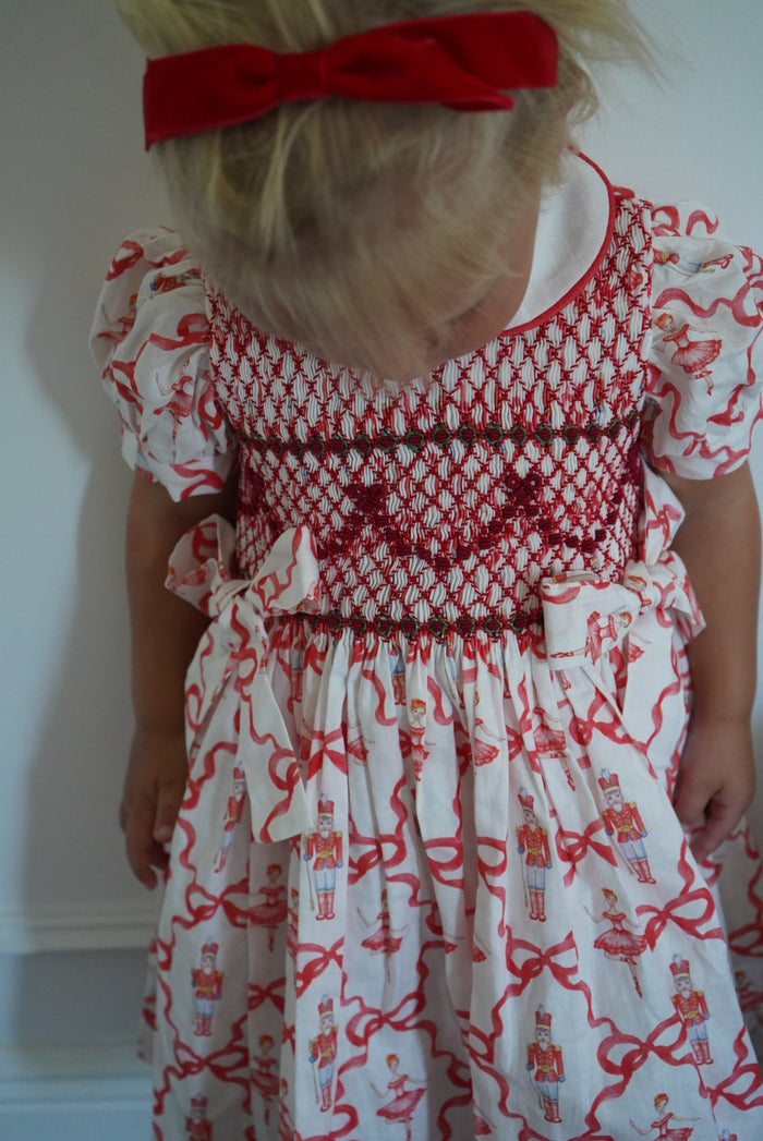 Nutcracker Red Bow Coquette Handsmocked Dress