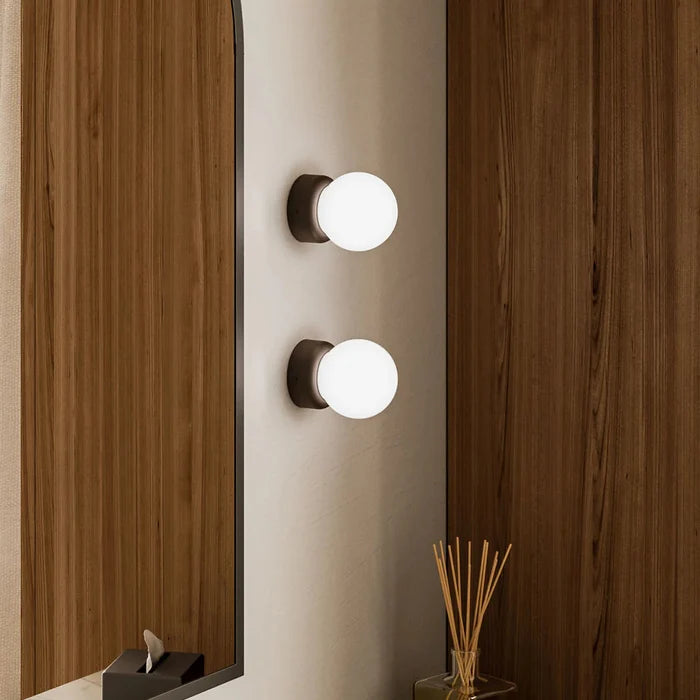 Modern IP44 wall light by Lighting Republic suitable for bathroom and bedside lighting