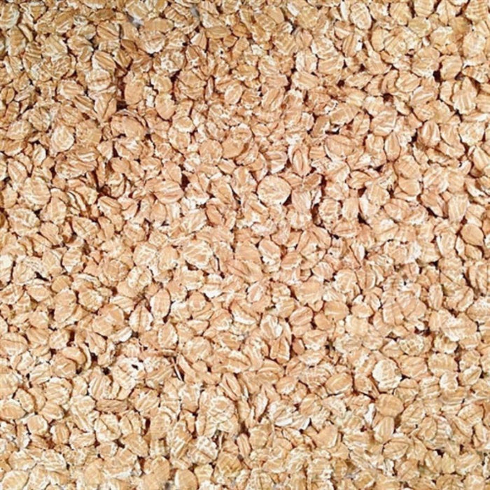 Pile Of Raw, Whole, Organic Rolled Spelt