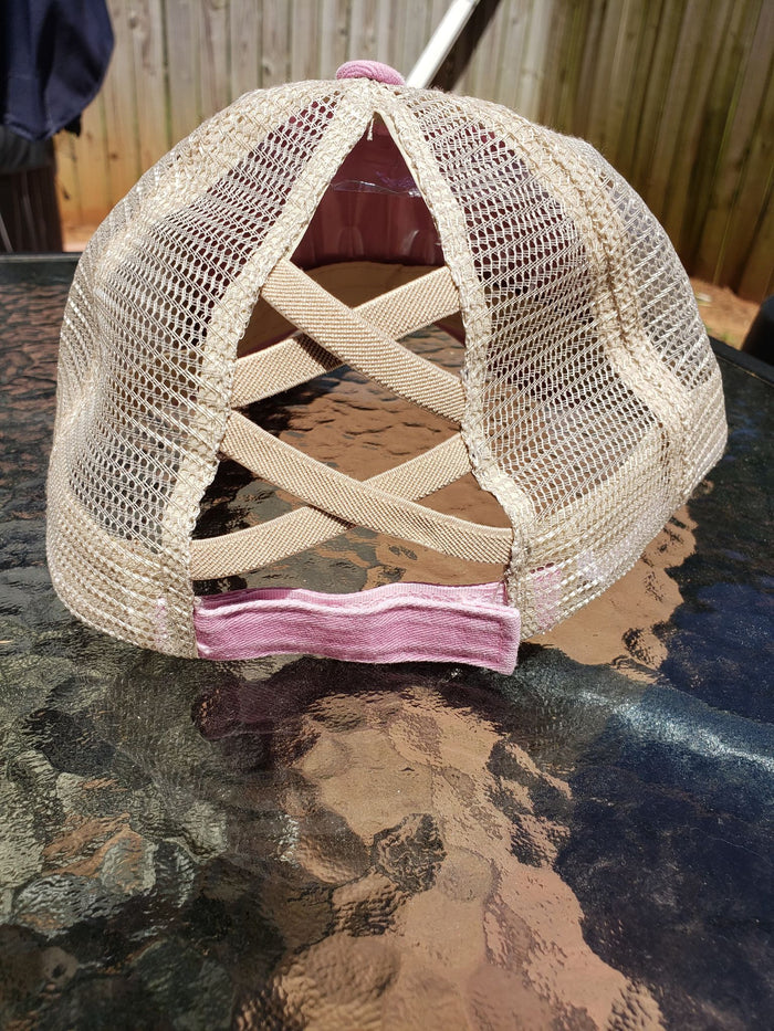 Pink criss cross ponytail hat