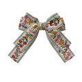 Rifle Paper Co. Garden Study Jacquard Ribbon Bow Clip with colorful floral embroidered pattern on cream background