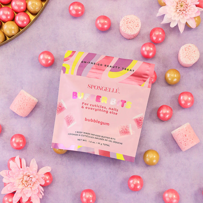 SPONGELLÉ Bubblegum Buffer Bits displayed on purple background with pearls, flowers, and sponges