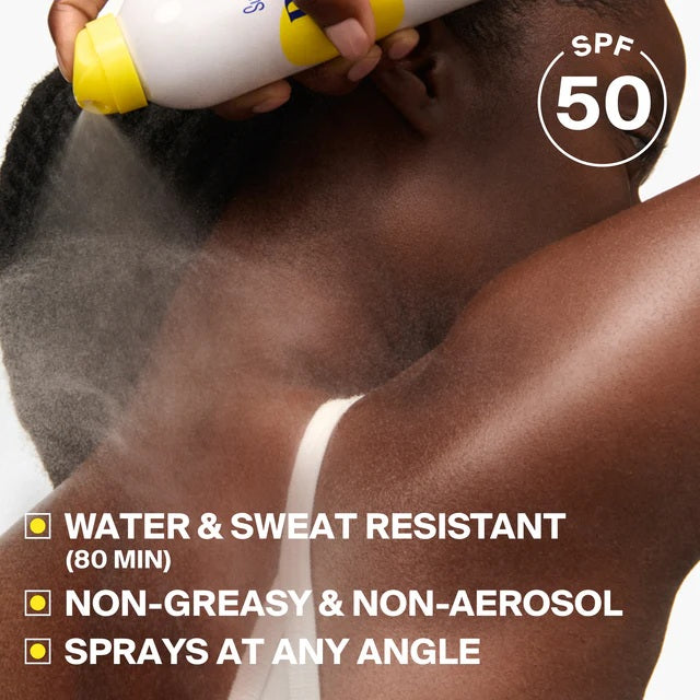 Supergoop! PLAY Antioxidant Body Mist SPF 50 spray in use