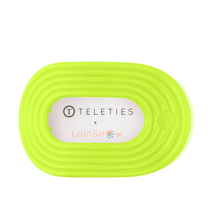 TELETIES Flat Round Palm Glow Large hair clip in neon yellow on black background