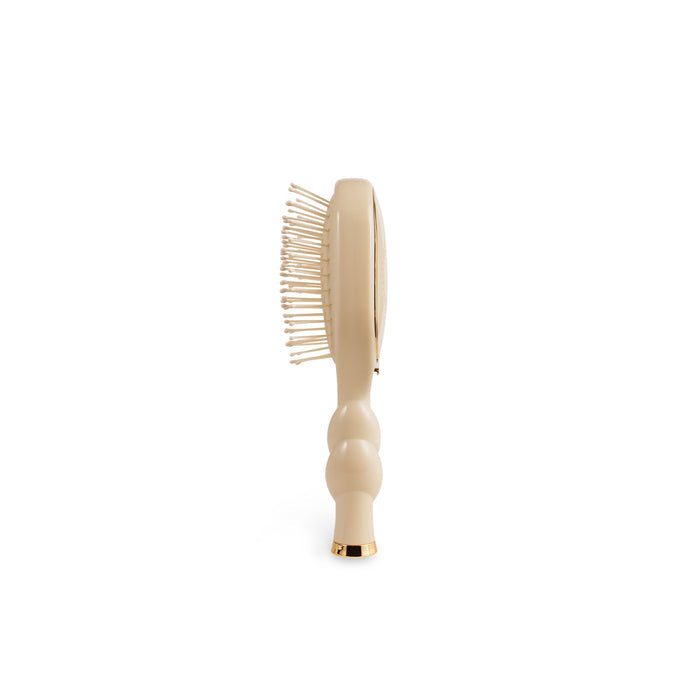 TELETIES Mini Detangler Brush for Medium Hair in Tan with dual-sided bristles on white background